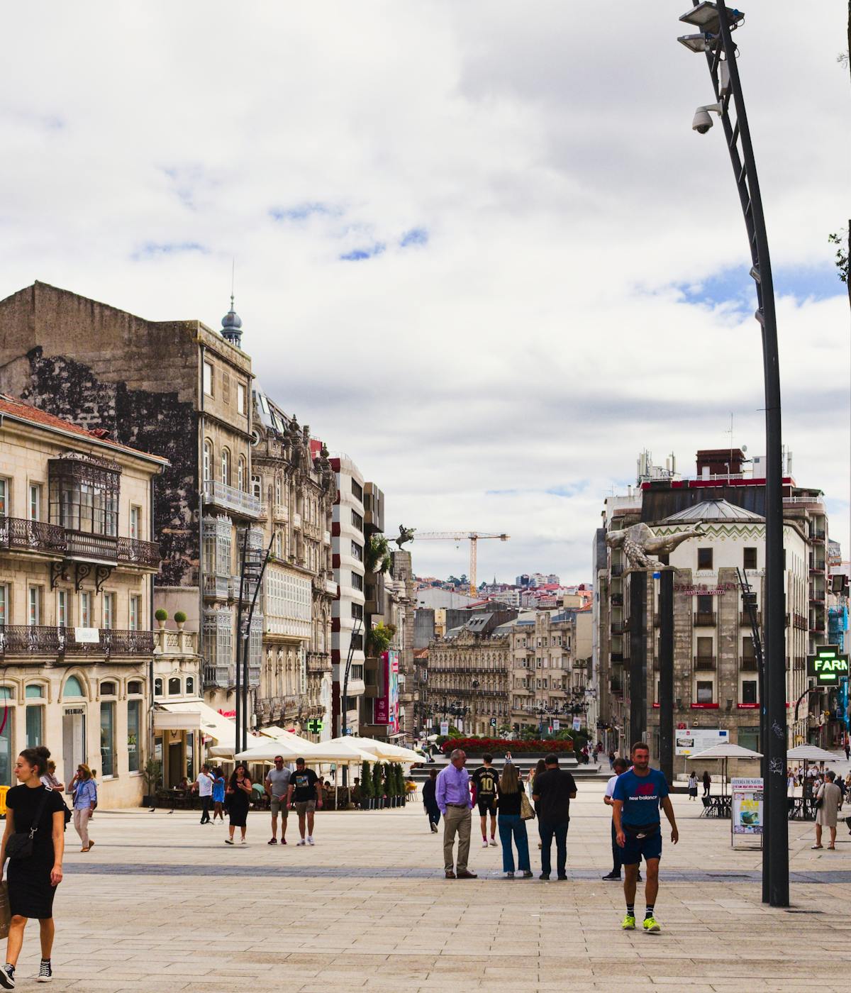 People walking around in the center of Vigo looking for Things to do in Vigo.